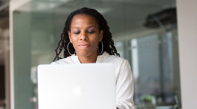 Hull Online student working on a laptop